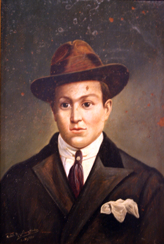 Retrato con sombrero (R. del Águila).